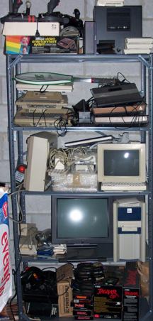 Shelf of old videogames and computers